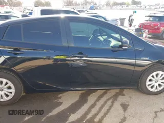 2020 Toyota Prius L Eco z VIN JTDKARFU6L3104385, wystawiony jako IAAI lot #41922029 z przebiegiem 123 235 mil mil oraz . Historia ofert i sprzedaży dostępna na DreamBid. Obrazek 13.