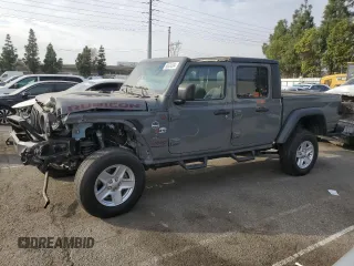 2023 Jeep Gladiator Rubicon with VIN 1C6JJTBG4PL562478, listed as a Copart auction lot 80334094 with 14,053 mi miles and Salvage Title. Bid and sale history available at carsss.com. Image 1.