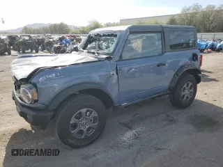 2023 Ford Bronco z VIN 1FMDE5AH6PLB63177, wystawiony jako Copart lot #52208625 z przebiegiem 10 865 mil mil oraz Szkoda całkowita • Salvage title. Historia ofert i sprzedaży dostępna na DreamBid. Obrazek 1.