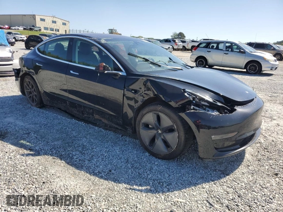 2018 Tesla Model 3 Long Range Battery with VIN 5YJ3E1EA6JF075813, listed as a Copart auction lot 52316125 with 101,460 mi miles and Salvage Title. Bid and sale history available at DreamBid. Image 4.