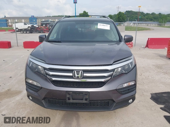 2017 Honda Pilot EX-L with VIN 5FNYF6H53HB038128, listed as a IAAI auction lot 42300311 with 176,928 mi miles and . Bid and sale history available at DreamBid. Image 12.