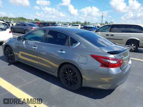 2017 Nissan Altima S with VIN 1N4AL3AP0HC297523, listed as a IAAI auction lot 42525818 with 162,767 mi miles and . Bid and sale history available at DreamBid. Image 3.