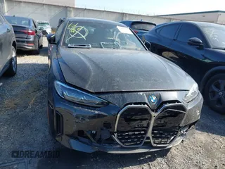 2023 BMW i4 eDrive40 z VIN WBY73AW03PFR16924, wystawiony jako IAAI lot #42034635 z przebiegiem 15 136 mil mil oraz . Historia ofert i sprzedaży dostępna na DreamBid. Obrazek 12.