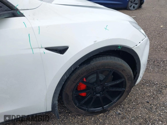 2022 Tesla Model Y Long Range z VIN 7SAYGDEE3NF426481, wystawiony jako IAAI lot #42076729 z przebiegiem 21 648 mil mil oraz . Historia ofert i sprzedaży dostępna na DreamBid. Obrazek 22.