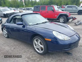 2001 Porsche 911 with VIN WP0CA29931S652043, listed as a IAAI auction lot 42323357 with 100,910 mi miles and . Bid and sale history available at DreamBid. Image 1.