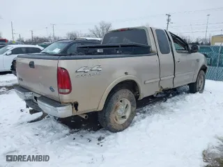 1998 Ford F-150 Standard with VIN 1FTZX18W4WNB04665, listed as a IAAI auction lot 41255136 with 182,272 mi miles. Bid and sale history available at carsss.com. Image 4.