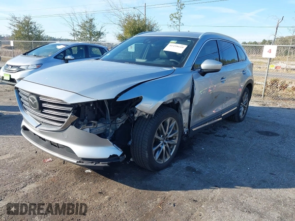 2017 Mazda CX-9 Grand Touring with VIN JM3TCADY5H0138176, listed as a IAAI auction lot 41458610 with 114,664 mi miles and . Bid and sale history available at DreamBid. Image 17.