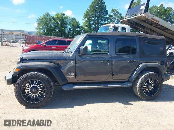 2018 Jeep Wrangler Unlimited Sport S с VIN 1C4HJXDN6JW277829, выставлен на аукционе IAAI как лот 42607187 с пробегом 107 461 миль миль и . История ставок и продаж доступна на DreamBid. Изображение 14.