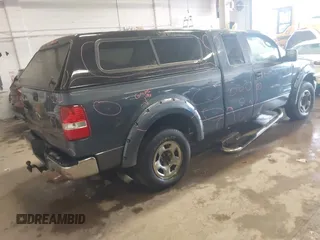 2005 Ford F-150 XLT with VIN 1FTPX14555NA01757, listed as a IAAI auction lot 41935980 with 145,311 mi miles. Bid and sale history available at carsss.com. Image 4.