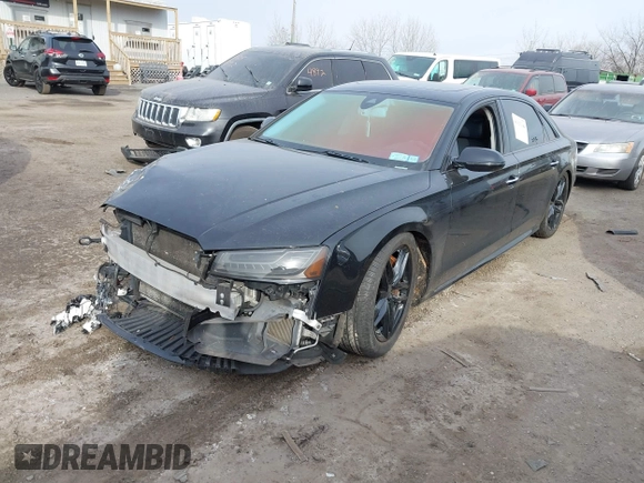 2016 Audi A8 L 4.0T Sport with VIN WAU43AFDXGN005323, listed as a IAAI auction lot 41311344 with 84,000 mi miles. Bid and sale history available at carsss.com. Image 2.