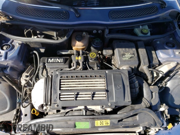 2007 MINI Convertible S with VIN WMWRH33547TL93855, listed as a Copart auction lot 78313133 with 130,832 mi miles and Salvage title. Bid and sale history available at DreamBid. Image 11.