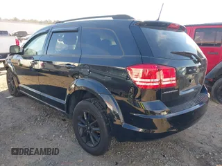 2020 Dodge Journey SE Value with VIN 3C4PDCABXLT259462, listed as a IAAI auction lot 41330782 with 67,380 mi miles and . Bid and sale history available at carsss.com. Image 3.
