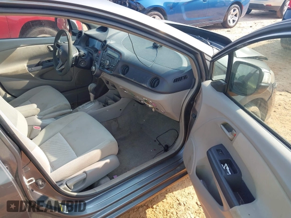 2010 Honda Insight EX with VIN JHMZE2H74AS027020, listed as a IAAI auction lot 42394875 with 248,003 mi miles and . Bid and sale history available at DreamBid. Image 5.