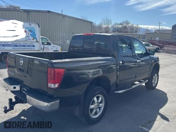 2004 Nissan Titan LE with VIN 1N6AA07A84N590583, listed as a Copart auction lot 49112705 with 92,426 mi miles and Salvage Title. Bid and sale history available at DreamBid. Image 4.