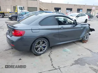 2015 BMW 2 Series M235i with VIN WBA1J7C50FV358774, listed as a IAAI auction lot 41559637 with 82,344 mi miles and . Bid and sale history available at carsss.com. Image 4.