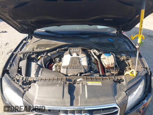 2014 Audi A7 Premium Plus z VIN WAUWGAFC4EN092525, wystawiony jako IAAI lot #42331183 z przebiegiem 183 258 mil mil oraz . Historia ofert i sprzedaży dostępna na DreamBid. Obrazek 10.