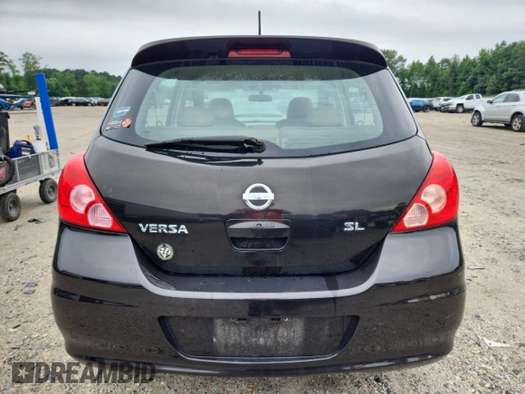 2010 Nissan Versa SL with VIN 3N1BC1CP1AL458944, listed as a Copart auction lot 64221065 with 131,163 mi miles and Salvage title. Bid and sale history available at DreamBid. Image 6.