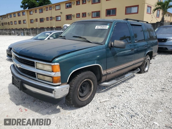 1995 Chevrolet Tahoe z VIN 1GNEC13K1SJ439759, wystawiony jako Copart lot #57784845 z przebiegiem 190 566 mil mil oraz Czysty tytuł • Clean title. Historia ofert i sprzedaży dostępna na DreamBid. Obrazek 1.