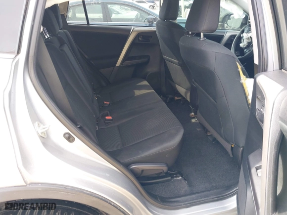 2018 Toyota RAV4 LE with VIN 2T3ZFREV2JW464807, listed as a IAAI auction lot 40966277 with 113,053 mi miles. Bid and sale history available at carsss.com. Image 8.