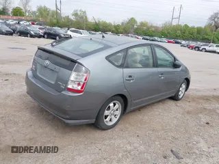 2005 Toyota Prius with VIN JTDKB20U153113348, listed as a IAAI auction lot 42048356 with 230,089 mi miles. Bid and sale history available at carsss.com. Image 4.