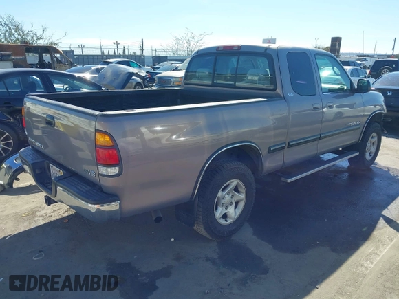 2001 Toyota Tundra SR5 with VIN 5TBRT34101S180512, listed as a IAAI auction lot 41802897 with 216,799 mi miles. Bid and sale history available at carsss.com. Image 4.
