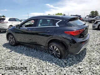 2018 Infiniti QX30 Luxury with VIN SJKCH5CR5JA056439, listed as a Copart auction lot 56048085 with 121,060 mi miles and Salvage title. Bid and sale history available at DreamBid. Image 2.