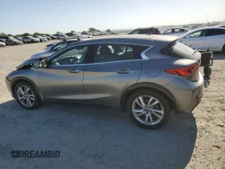 2018 Infiniti QX30 Luxury with VIN SJKCH5CP3JA060276, listed as a Copart auction lot 52947805 with 73,401 mi miles and Salvage title. Bid and sale history available at DreamBid. Image 2.