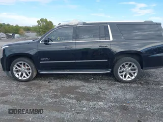 2017 GMC Yukon XL Denali with VIN 1GKS2HKJ4HR384139, listed as a IAAI auction lot 40239513 with 103,603 mi miles. Bid and sale history available at carsss.com. Image 14.