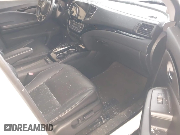 2019 Honda Pilot Elite with VIN 5FNYF6H08KB054725, listed as a IAAI auction lot 40496860 with 91,284 mi miles and . Bid and sale history available at DreamBid. Image 5.