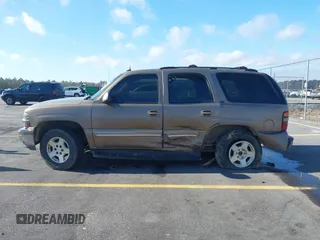 2004 Chevrolet Tahoe LT with VIN 1GNEC13Z24J170834, listed as a IAAI auction lot 41149637 with 362,679 mi miles and . Bid and sale history available at DreamBid. Image 14.