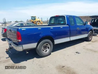 1998 Ford F-150 with VIN 1FTZX1728WKA58760, listed as a IAAI auction lot 42832277 with 189,085 mi miles and . Bid and sale history available at DreamBid. Image 4.