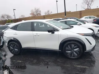 2024 Nissan ARIYA Evolve+ z VIN JN1BF0BAXRM435453, wystawiony jako IAAI lot #41745123 z przebiegiem 5 565 mil mil oraz . Historia ofert i sprzedaży dostępna na DreamBid. Obrazek 14.