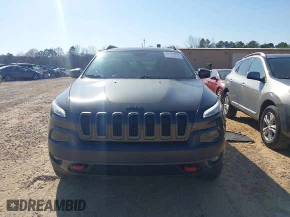 2014 Jeep Cherokee Trailhawk with VIN 1C4PJMBS6EW278987, listed as a IAAI auction lot 41789868 with 136,696 mi miles. Bid and sale history available at carsss.com. Image 13.