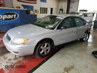 2005 Ford Taurus SE z VIN 1FAFP53215A133518, wystawiony jako Copart lot #59615205 z przebiegiem 127 778 mil mil oraz Szkoda całkowita • Salvage title. Historia ofert i sprzedaży dostępna na DreamBid. Obrazek 1.