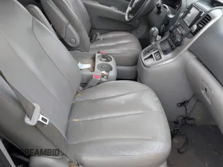 2010 Kia Sedona EX with VIN KNDMH4C33A6342127, listed as a IAAI auction lot 41570657 with 249,395 mi miles. Bid and sale history available at carsss.com. Image 5.