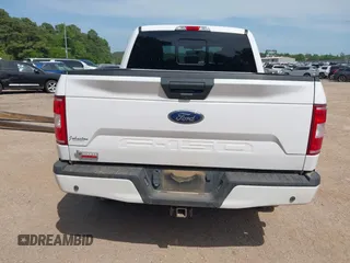 2020 Ford F-150 XL with VIN 1FTEW1E59LKE78957, listed as a IAAI auction lot 42021245 with 92,322 mi miles and . Bid and sale history available at DreamBid. Image 16.