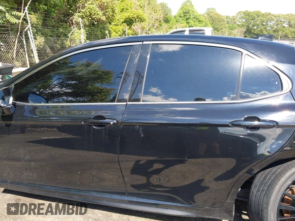 2022 Toyota Camry TRD with VIN 4T1KZ1AK2NU064511, listed as a IAAI auction lot 42176608 with 28,064 mi miles and . Bid and sale history available at DreamBid. Image 14.