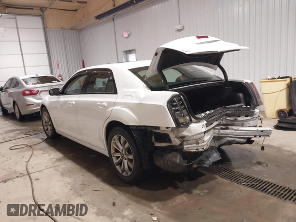 2014 Chrysler 300 with VIN 2C3CCAGGXEH384728, listed as a IAAI auction lot 41394638 with 151,362 mi miles. Bid and sale history available at carsss.com. Image 3.
