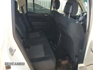2015 Jeep Patriot High Altitude with VIN 1C4NJRFB5FD169156, listed as a Copart auction lot 50393335 with 122,233 mi miles and Salvage title. Bid and sale history available at DreamBid. Image 10.