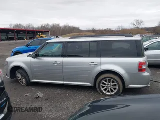2016 Ford Flex SE with VIN 2FMGK5B80GBA12646, listed as a IAAI auction lot 41141786 with 100,000 mi miles. Bid and sale history available at carsss.com. Image 13.