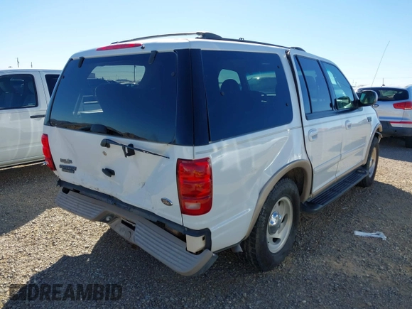 1999 Ford Expedition XLT z VIN 1FMPU18L2XLB77547, wystawiony jako IAAI lot #41161721 z przebiegiem 205 649 mil mil oraz . Historia ofert i sprzedaży dostępna na DreamBid. Obrazek 4.