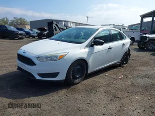 2016 Ford Focus S with VIN 1FADP3E2XGL289606, listed as a IAAI auction lot 41280110 with 48,234 mi miles and . Bid and sale history available at carsss.com. Image 2.
