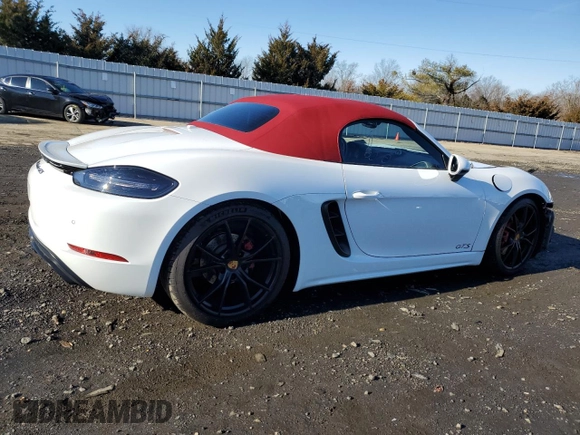 2018 Porsche 718 Boxster S z VIN WP0CB2A82JS229275, wystawiony jako Copart lot #36833274 z przebiegiem 22 752 mil mil oraz . Historia ofert i sprzedaży dostępna na DreamBid. Obrazek 3.