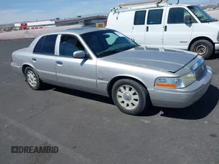 2004 Mercury Grand Marquis LS Premium z VIN 2MHHM75W64X672943, wystawiony jako IAAI lot #42128066 z przebiegiem 192 675 mil mil oraz . Historia ofert i sprzedaży dostępna na DreamBid. Obrazek 1.