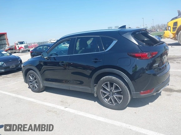 2018 Mazda CX-5 Grand Touring with VIN JM3KFADM2J1324547, listed as a IAAI auction lot 41947497 with 66,254 mi miles. Bid and sale history available at carsss.com. Image 14.