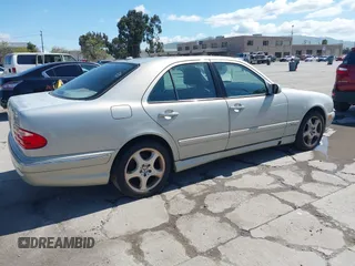 2001 Mercedes-Benz E-Class with VIN WDBJF65J81B314801, listed as a IAAI auction lot 41949755 with 254,836 mi miles. Bid and sale history available at carsss.com. Image 4.