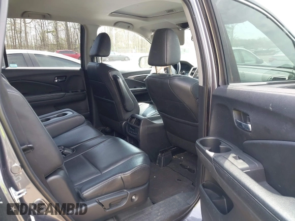 2016 Honda Pilot EX-L with VIN 5FNYF6H53GB004091, listed as a IAAI auction lot 42002063 with 173,009 mi miles. Bid and sale history available at carsss.com. Image 8.
