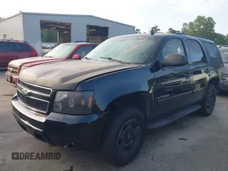 2008 Chevrolet Tahoe LS with VIN 1GNFC13C38R237657, listed as a IAAI auction lot 42620061 with 290,899 mi miles and . Bid and sale history available at DreamBid. Image 2.