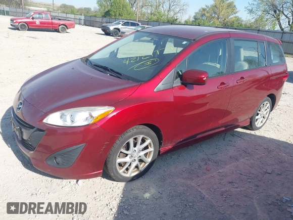 2012 Mazda 5 Touring with VIN JM1CW2CL3C0133076, listed as a IAAI auction lot 42121771 with 144,580 mi miles and . Bid and sale history available at DreamBid. Image 2.