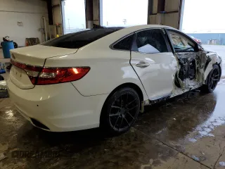 2013 Hyundai Azera z VIN KMHFH4JG0DA225049, wystawiony jako Copart lot #65530604 z przebiegiem 77 218 mil mil oraz Szkoda całkowita • Salvage title. Historia ofert i sprzedaży dostępna na DreamBid. Obrazek 3.